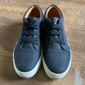 Black platform slip on sneakers
